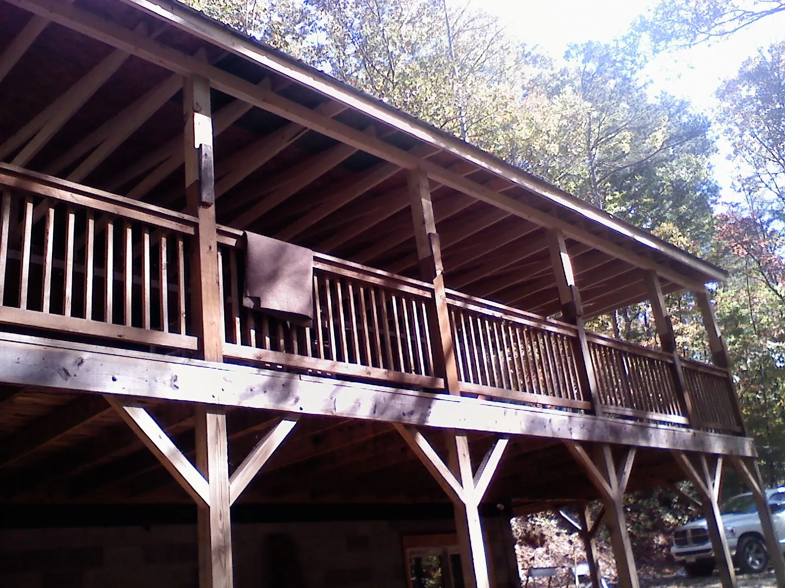 Timber framing under a new elevated porch and deck — Roof Leak Repair in Boyd by Roofing Brothers